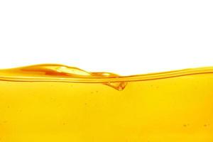 Wave of oil viscosity and air bubbles inside oil isolated on white background. photo