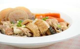 Salmon in soy source with vegetables, fish maw soup photo