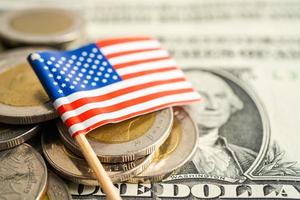 Stack of coins money with USA America flag, finance banking concept. photo