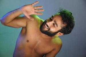 young man happy face without cloths studio shot photo