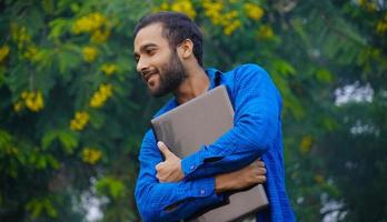 male student with laptop images photo