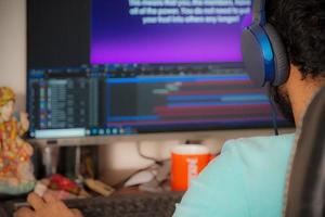 a freelancer video editor working on editing software photo