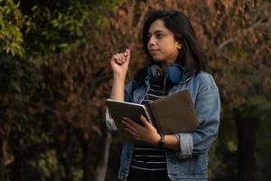 Girl of a college student in thinking photo