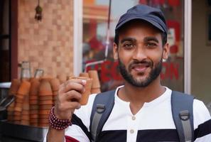 man with Brown Hand Building Mitti Kulhad - kulhad cup image photo