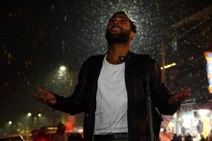 A man enjoying in snowfall photo