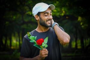 Imágenes de man with beautiful red roses smile lover foto