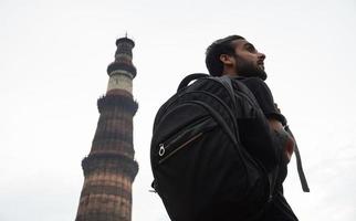 indian young handsome man at historical palace photo