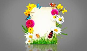 composición de flores. marco de fotos, flores de primavera sobre fondo de pergamino. foto
