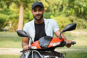 a man with his new scooter photo