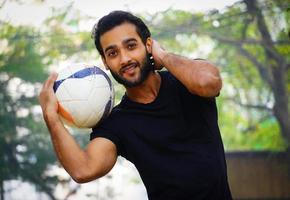 Young football player at the football Ground indian man image photo