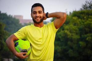 Young boy having football image photo