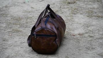 Alone gym bag on main road photo