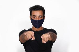 Man Having Mask and feels happy no fear of corona virus photo