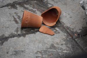 Broken cup of kulhar chai images photo