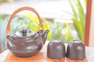 hand pour Chinese or Japanese traditional tea from clay pot