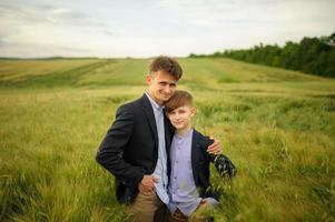 Happy family in the field photo