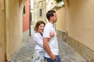 A couple in love on the streets of the old bridge photo