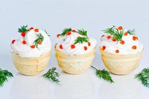 Homemade cakes with white cream photo