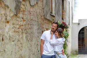 A couple in love on the streets of the old bridge photo