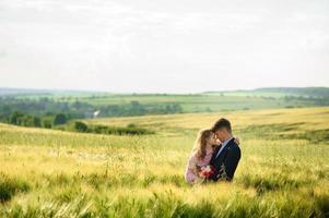 Happy family in the field photo