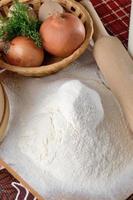 Chicken eggs with slices of bread on the table with milk photo