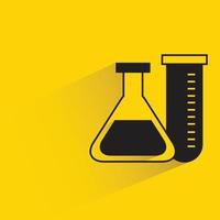 flask and tube on yellow background vector
