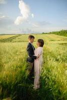 Happy family in the field photo