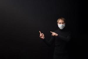 A masked man points to your test. photo