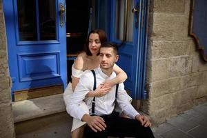 Beautiful stylish couple on a date on the streets in the old city. photo