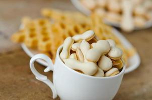 Many cookies on the wooden table photo