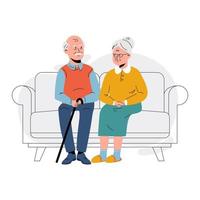 Elderly couple sitting on the sofa at home. Retired elderly couple in love. Grandparents family, grandmother and grandfather happy friends sitting on the couch