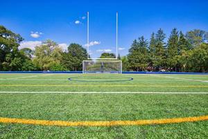 Football stadium and training field in university campus photo