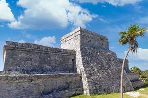 Temple of the God of Wind in Tulum Archaeological Zone with Mayan pyramids and ruins located on the scenic ocean shore of Quintana Roo province