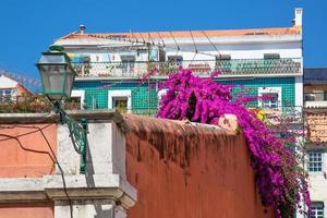 Typical Portuguese architecture and colorful buildings of Lisbon historic city center photo