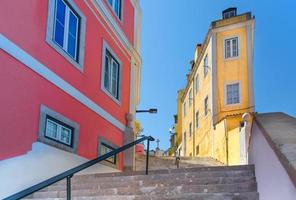 Typical Portuguese architecture and colorful buildings of Lisbon historic city center photo