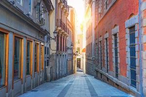 Colorful Narrow Streets of Madrid in historic city center photo