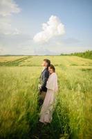 Happy family in the field photo