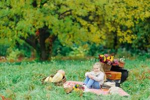 Mom and daughter on a picnic photo