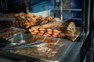 Pita and pastry from behind the glass photo