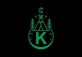 Green color of K initial letter in camping circle badge vector