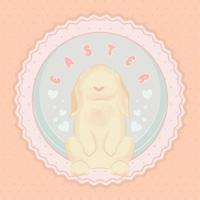 Isolated cute bunny on a pastry colored label Easter Vector