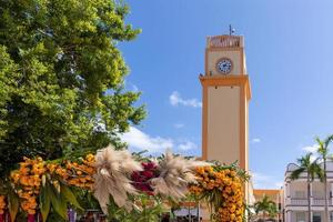 San Miguel de Cozumel, Mexico, Central Plaza and colorful colonial city downtown streets during peak months of high tourist season photo