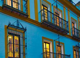 Seville streets at an early sunset in the historic center photo