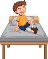 A boy with injure leg crying on the bed vector