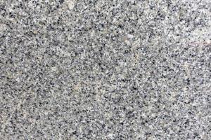 Gray terrazzo floor, wall or floor coverings in interior work. photo