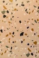 Terrazzo pattern with colorful rock pieces.The texture of the stone floor. photo