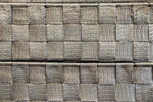 Image of a silver cloth texture woven into a square. fabric material for furniture photo