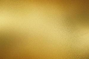 Scratches golden metal sheet, abstract texture background photo