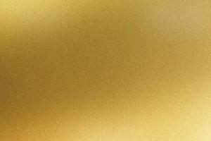 Rough gold metal thin sheet, abstract texture background photo
