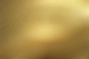Rough gold metal floor, abstract texture background photo